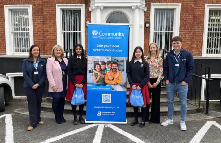 Community CU Staff standing outside St Dominics College Cabra fro a picture with the two students that will be representing the school at this years International Space Development Confernece.